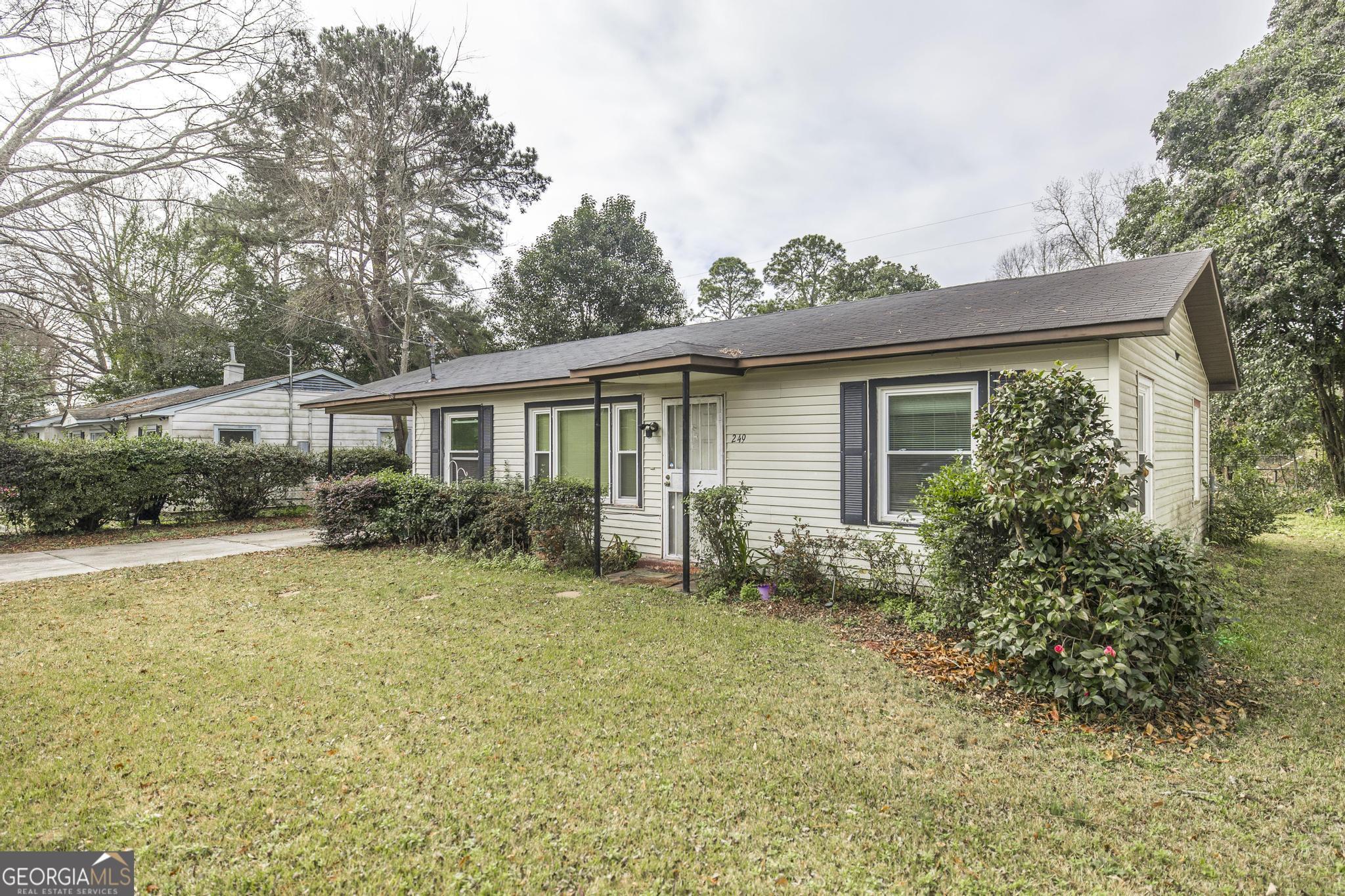 249 Ward Street Warner Robins, GA 31093 - Photo 2 of 22 a house view with a backyard space