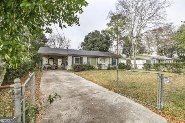 a view of house with outdoor space