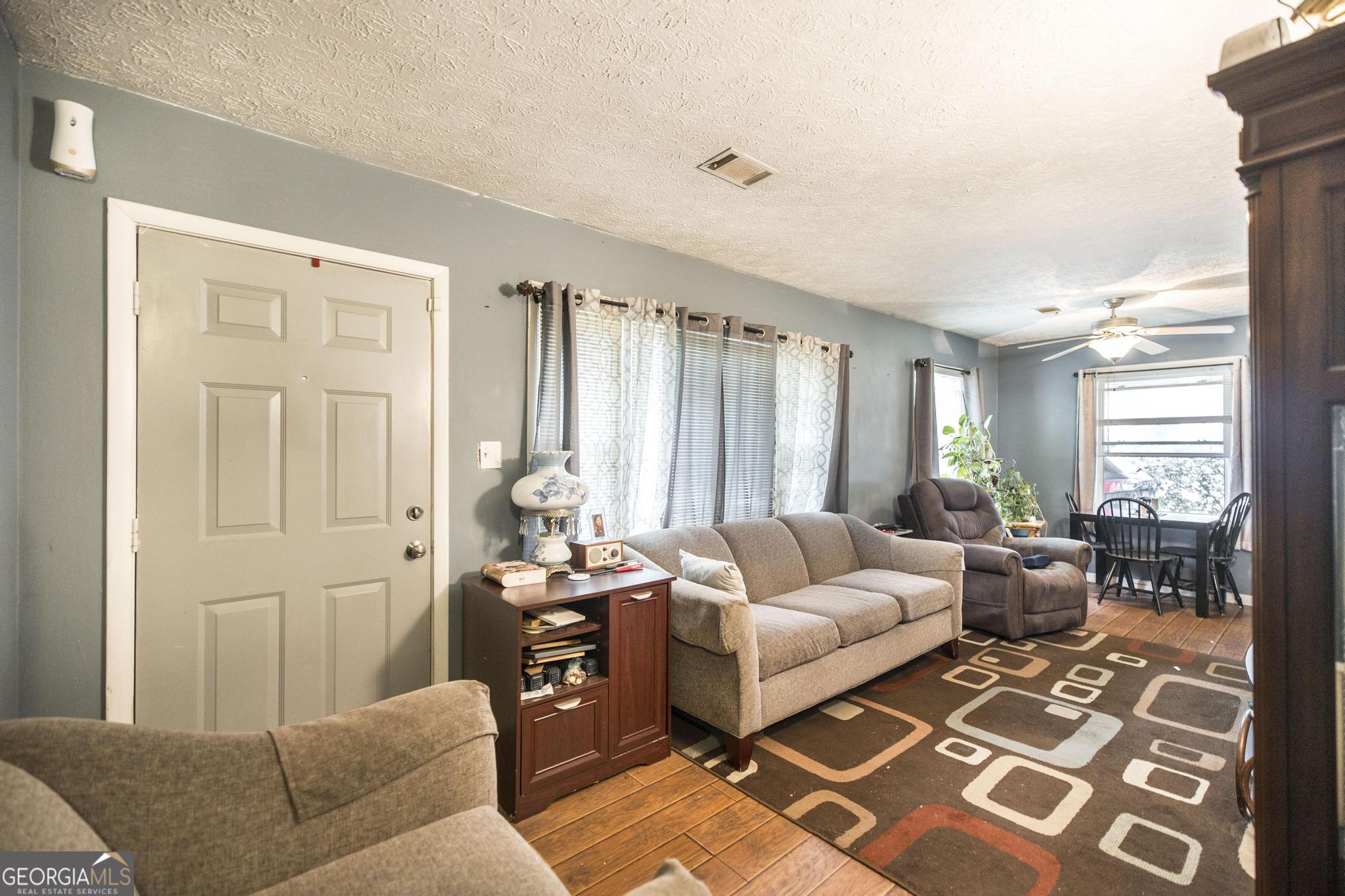 249 Ward Street Warner Robins, GA 31093 - Photo 7 of 22 a living room with furniture and a window