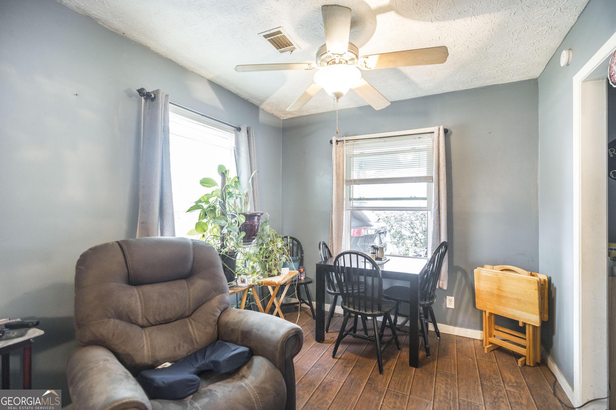 249 Ward Street Warner Robins, GA 31093 - Photo 8 of 22 a living room with furniture and a window