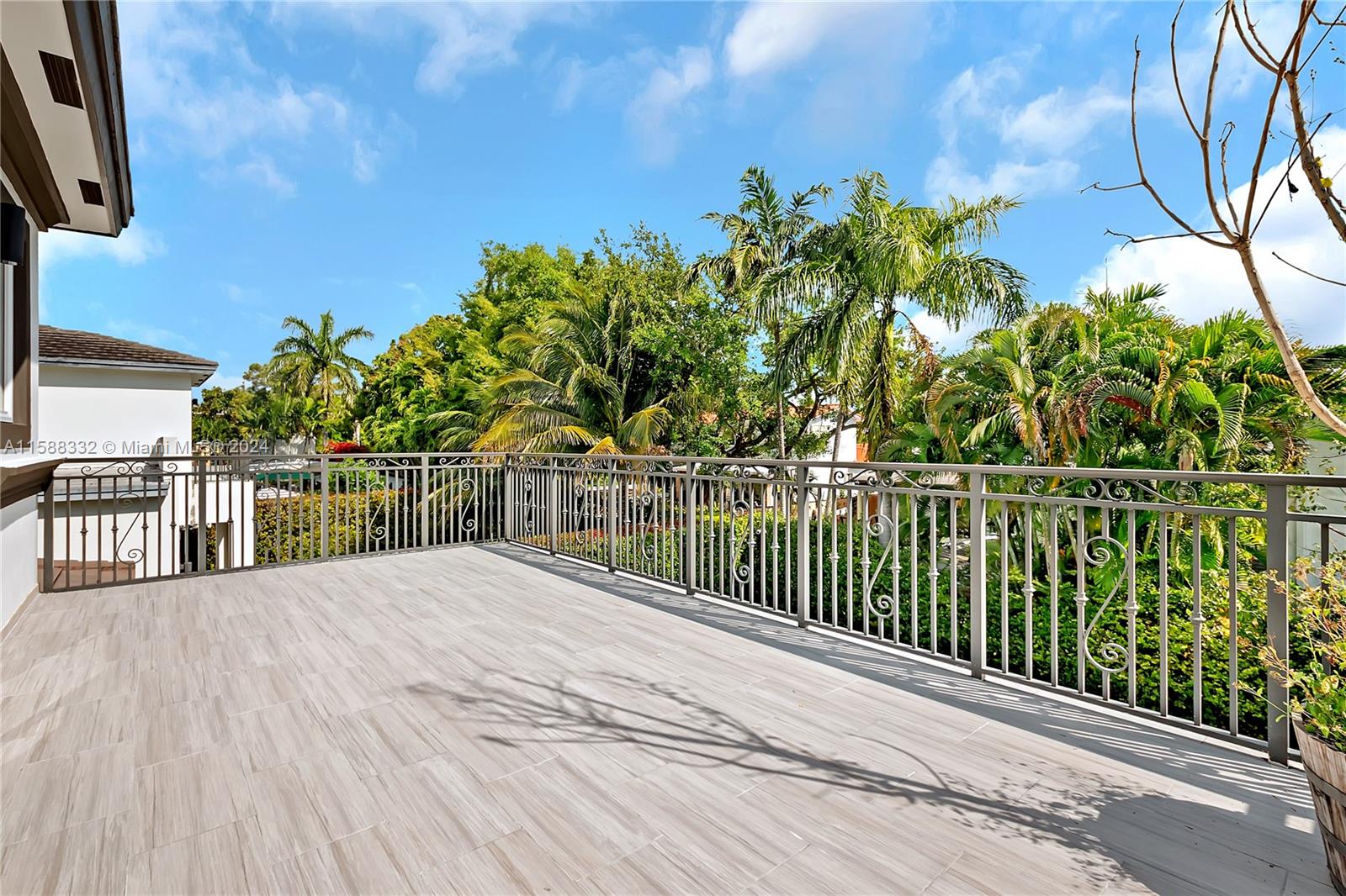 429 Southwest 23rd Road Miami, FL 33129 - Photo 18 of 46 a view of a balcony with wooden floor