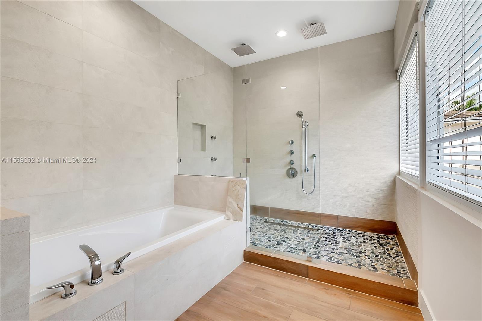 429 Southwest 23rd Road Miami, FL 33129 - Photo 22 of 46 a bathroom with a bathtub and shower