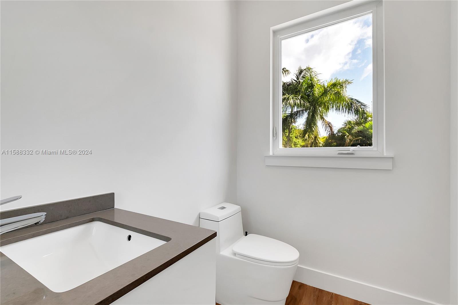 429 Southwest 23rd Road Miami, FL 33129 - Photo 24 of 46 a bathroom with a sink and a toilet