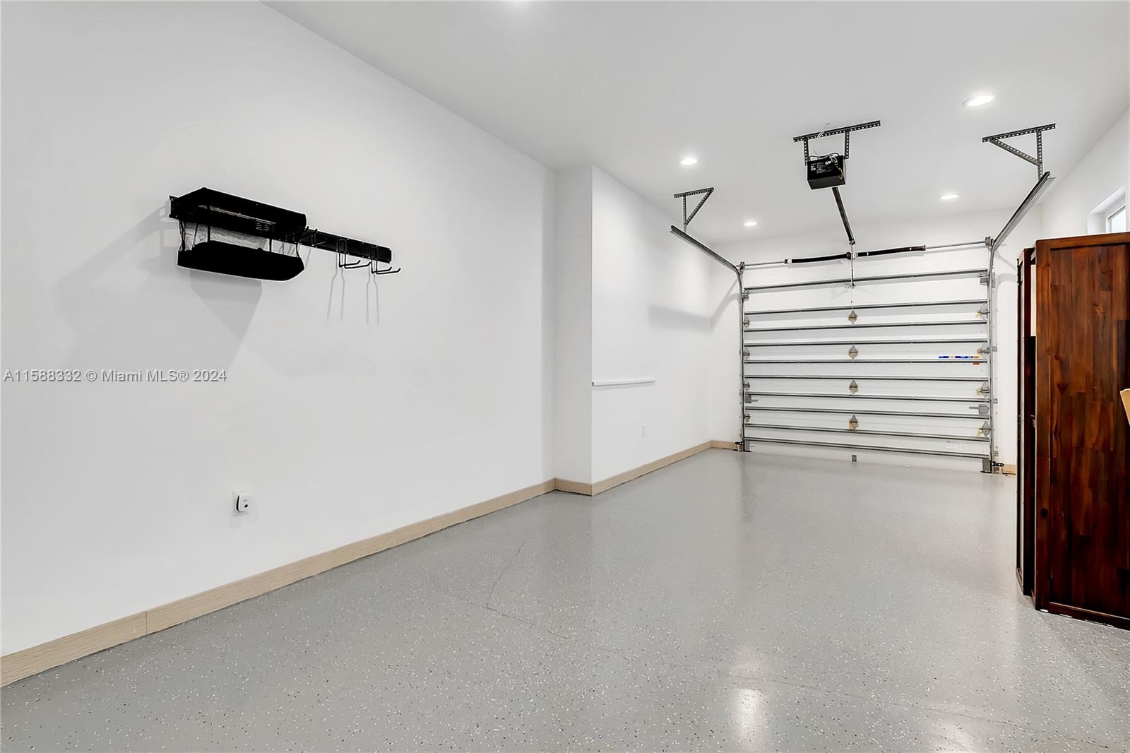 429 Southwest 23rd Road Miami, FL 33129 - Photo 26 of 46 an empty room with wooden floor and windows