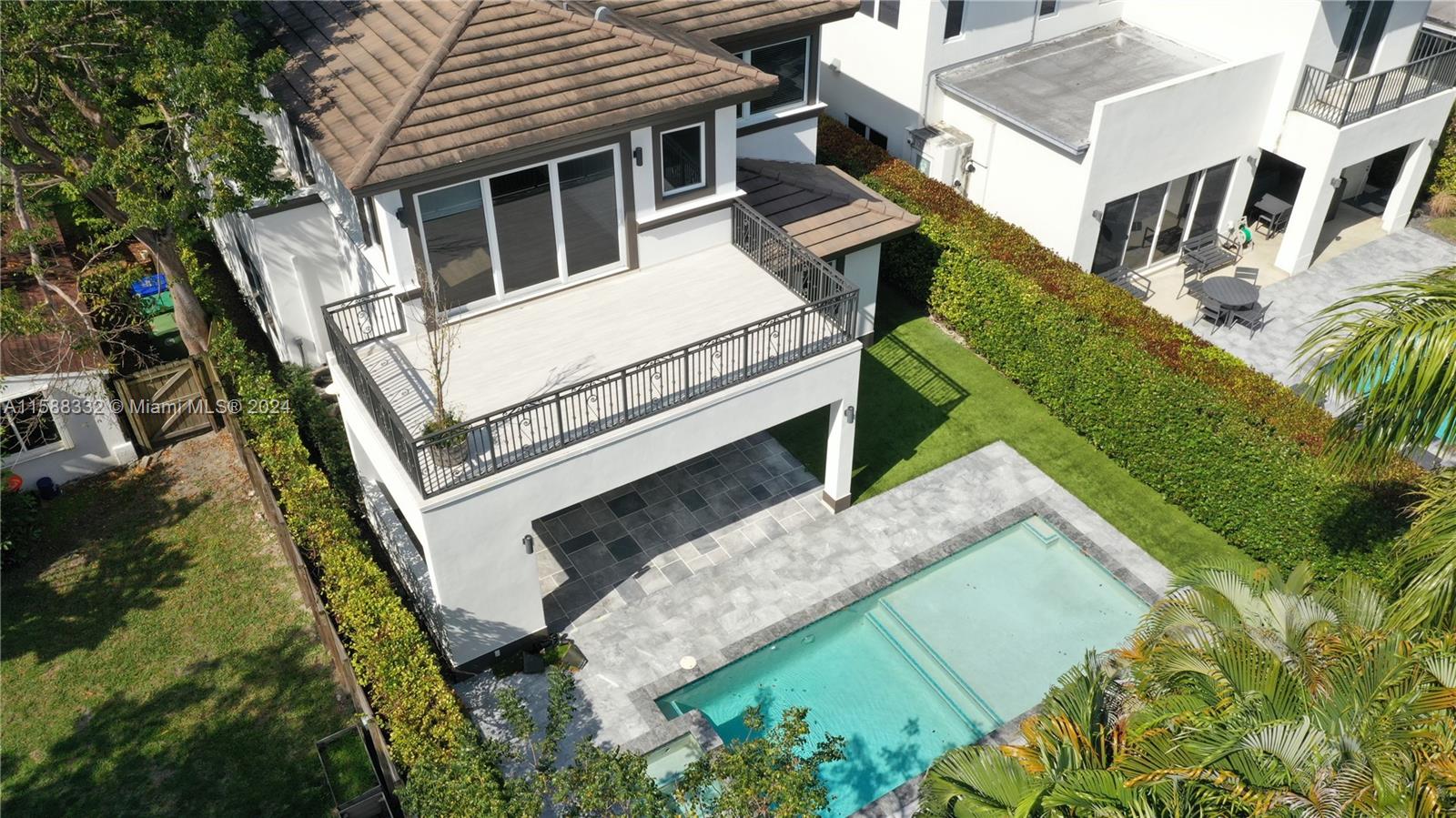 429 Southwest 23rd Road Miami, FL 33129 - Photo 40 of 46 a aerial view of a house with a yard