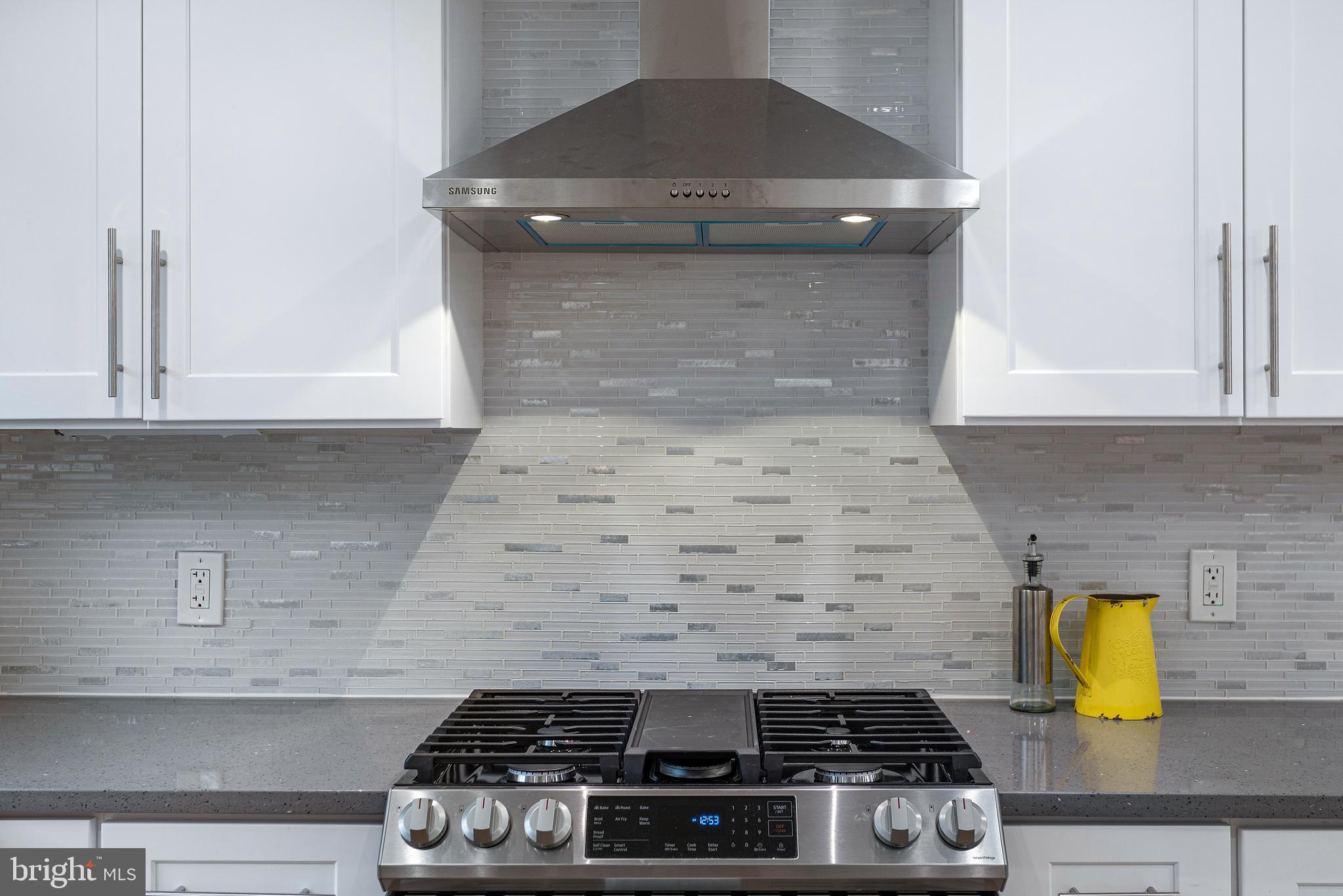 1354 Rittenhouse Street Northwest Washington, DC 20011 - Photo 5 of 37 gas range and vent hood
