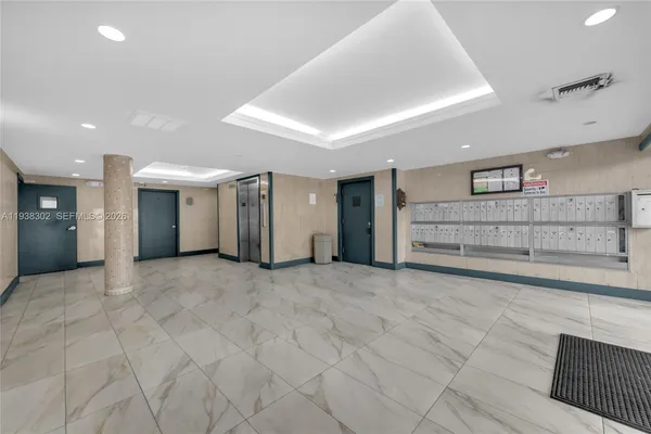 a view of a hallway with closet