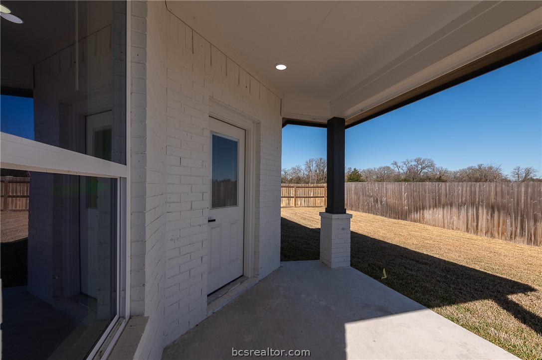2908 GOLDBERG Drive Bryan, TX 77808 - Photo 38 of 44 Covered back porch off of the living area features covered porch, privacy wood fenced yard plus fully sodded yard and irrigation system.