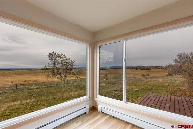 a view of a balcony with ocean view