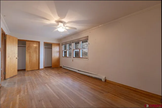 a bathroom with a granite countertop sink and a bathtub