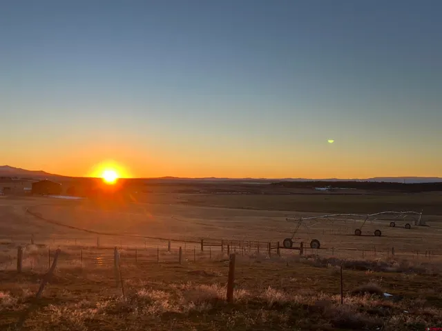 a view of a lake with mountain in the background