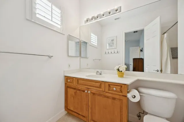 a utility room with a sink dryer and washer