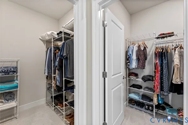 a view of a patio with table and chairs with wooden floor and fence