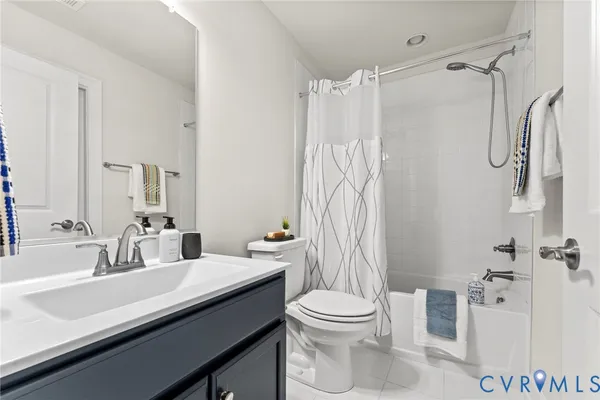 a bedroom with a bed and furniture