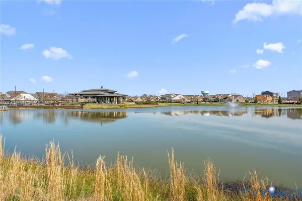 a view of houses with outdoor space and swimming pool