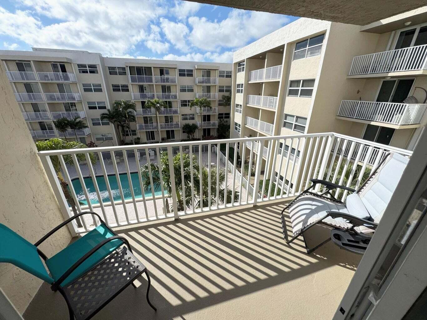 2929 South Ocean Boulevard, Unit 4130 Boca Raton, FL 33432 - Photo 11 of 17 a view of balcony with wooden floor