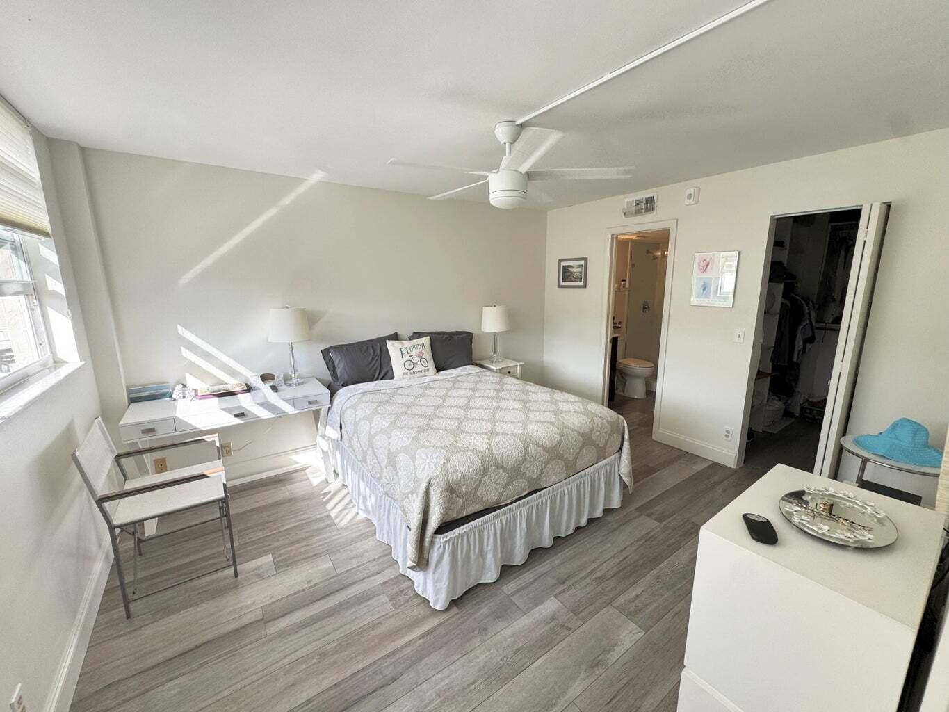 2929 South Ocean Boulevard, Unit 4130 Boca Raton, FL 33432 - Photo 4 of 17 a bedroom with a bed and a flat screen tv