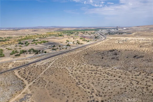 a view of a mountain from a yard