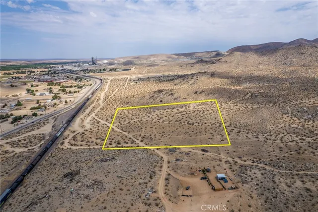 a view of a large building with a beach