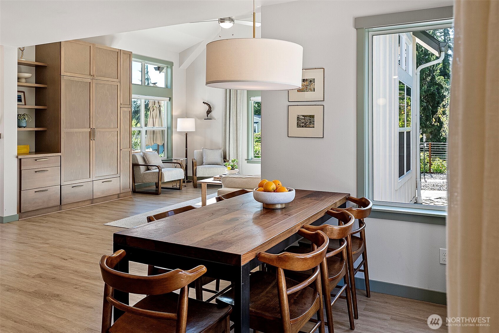 503 5th Street Steilacoom, WA 98388 - Photo 9 of 40 a view of a dining room with furniture window and wooden floor