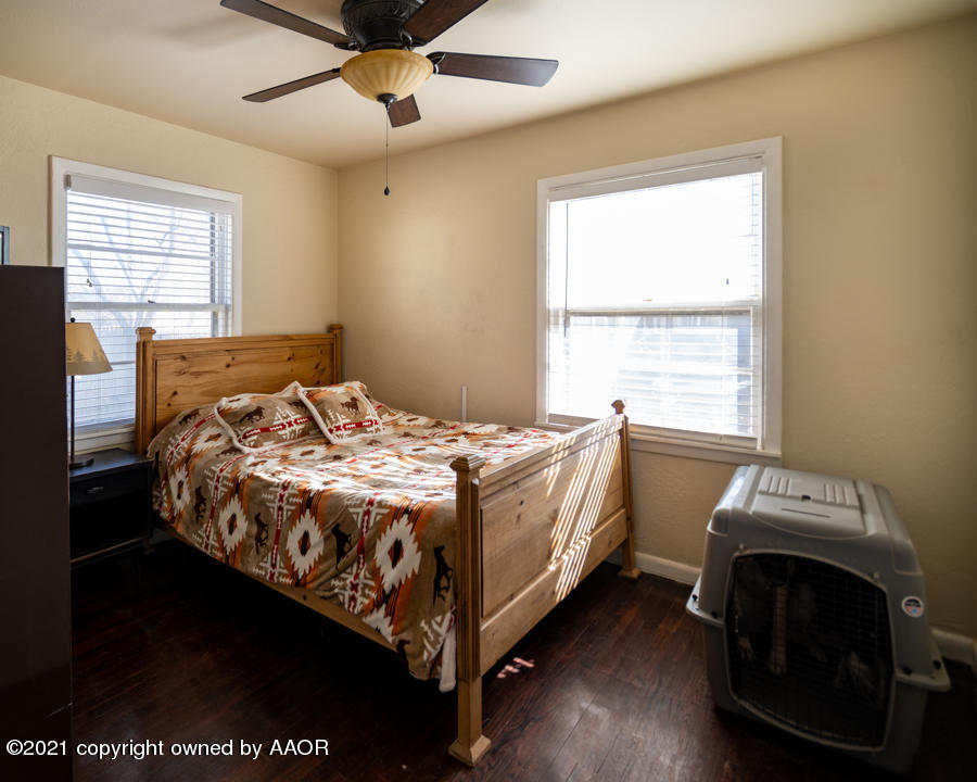 4207 South Lipscomb Street Amarillo, TX 79110 - Photo 14 of 23 a bedroom with a bed and a window