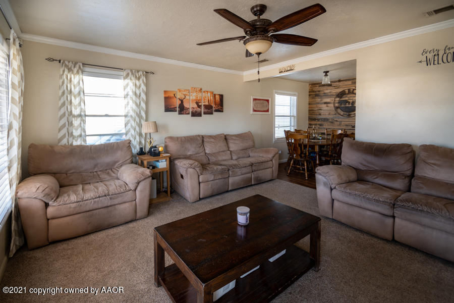 4207 South Lipscomb Street Amarillo, TX 79110 - Photo 4 of 23 a living room with furniture and a window
