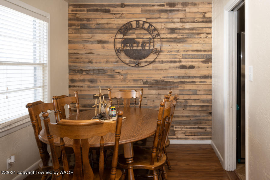 4207 South Lipscomb Street Amarillo, TX 79110 - Photo 7 of 23 a view of a dining room with furniture and window