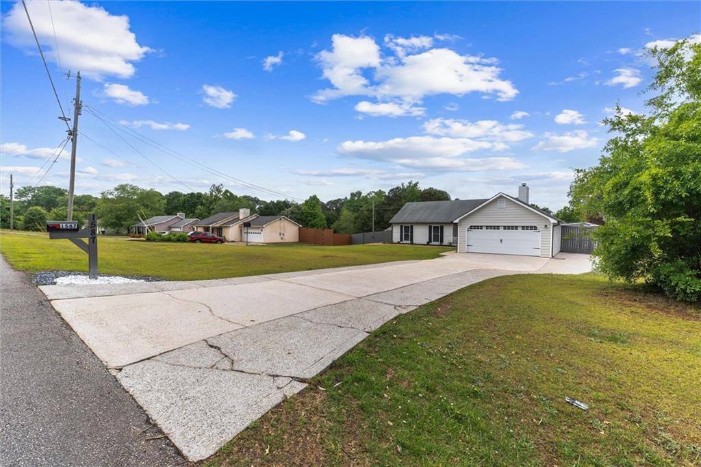 1587 Cronic Town Road Auburn, GA 30011 - Photo 4 of 56