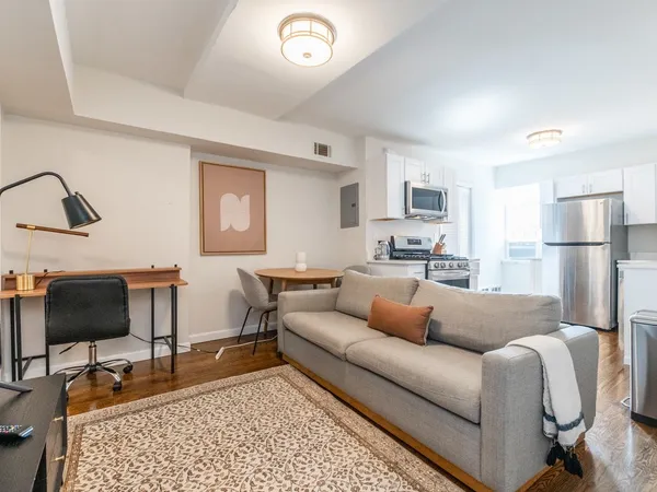 a living room with a couch and a coffee table