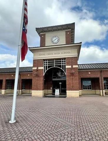 a sign on the wall of building