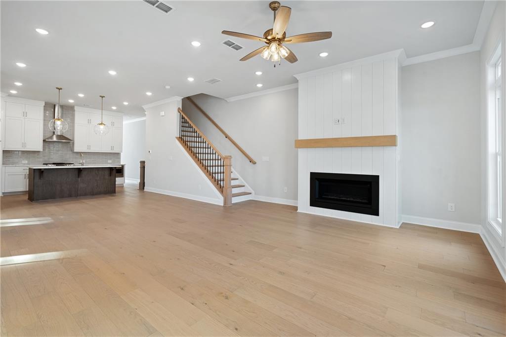 502 Whatton Road, Unit 1 Johns Creek, GA 30022 - Photo 8 of 34 a view of an empty room with a fireplace and window