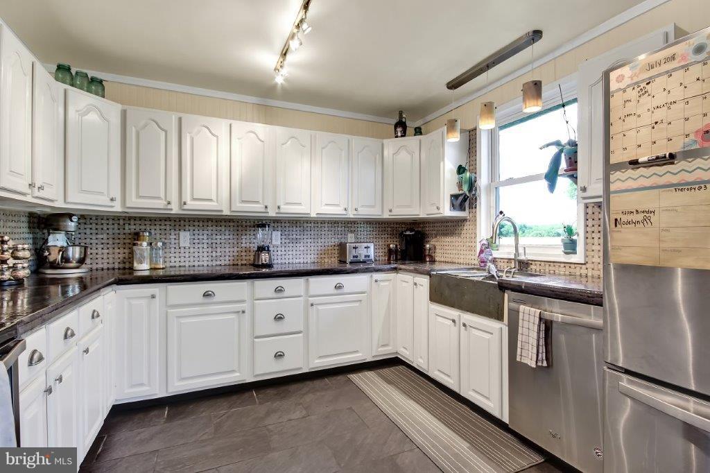 144 Spears Hill Road Elkton, MD 21921 - Photo 9 of 28 Poured concrete counter tops - Farm sink
