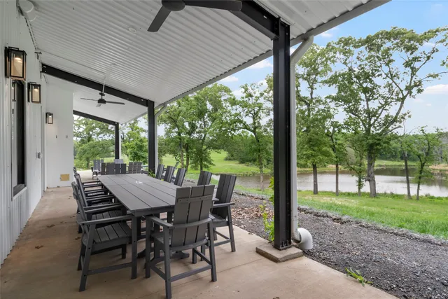 a view of a swimming pool with a yard