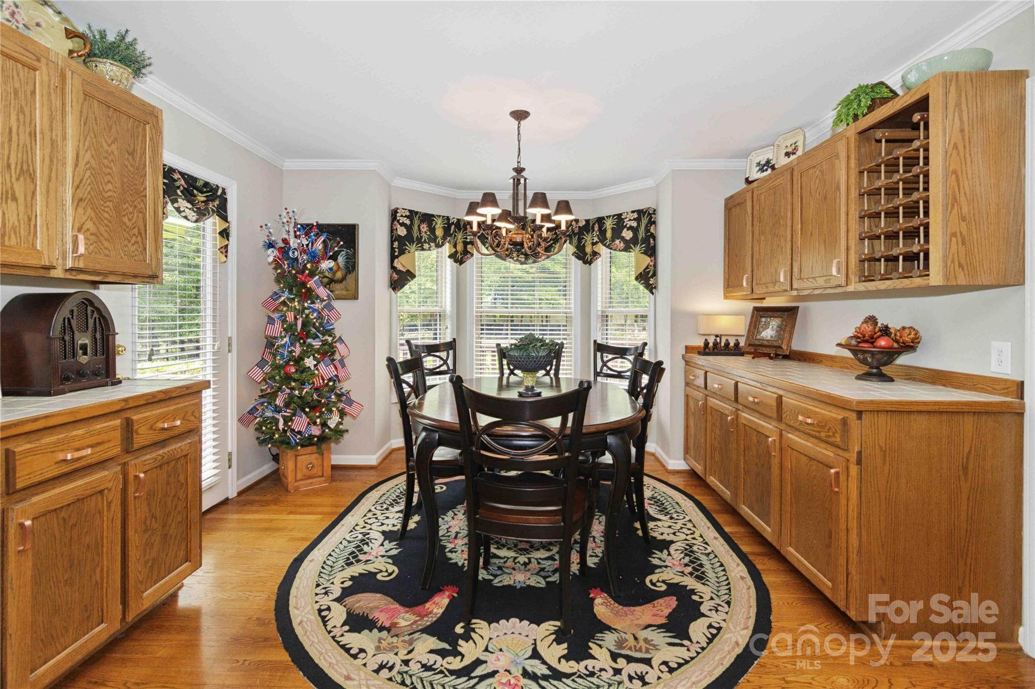 865 State Rd S-46-151 Clover, SC 29710 - Photo 12 of 48 a view of a dining room with furniture window and wooden floor