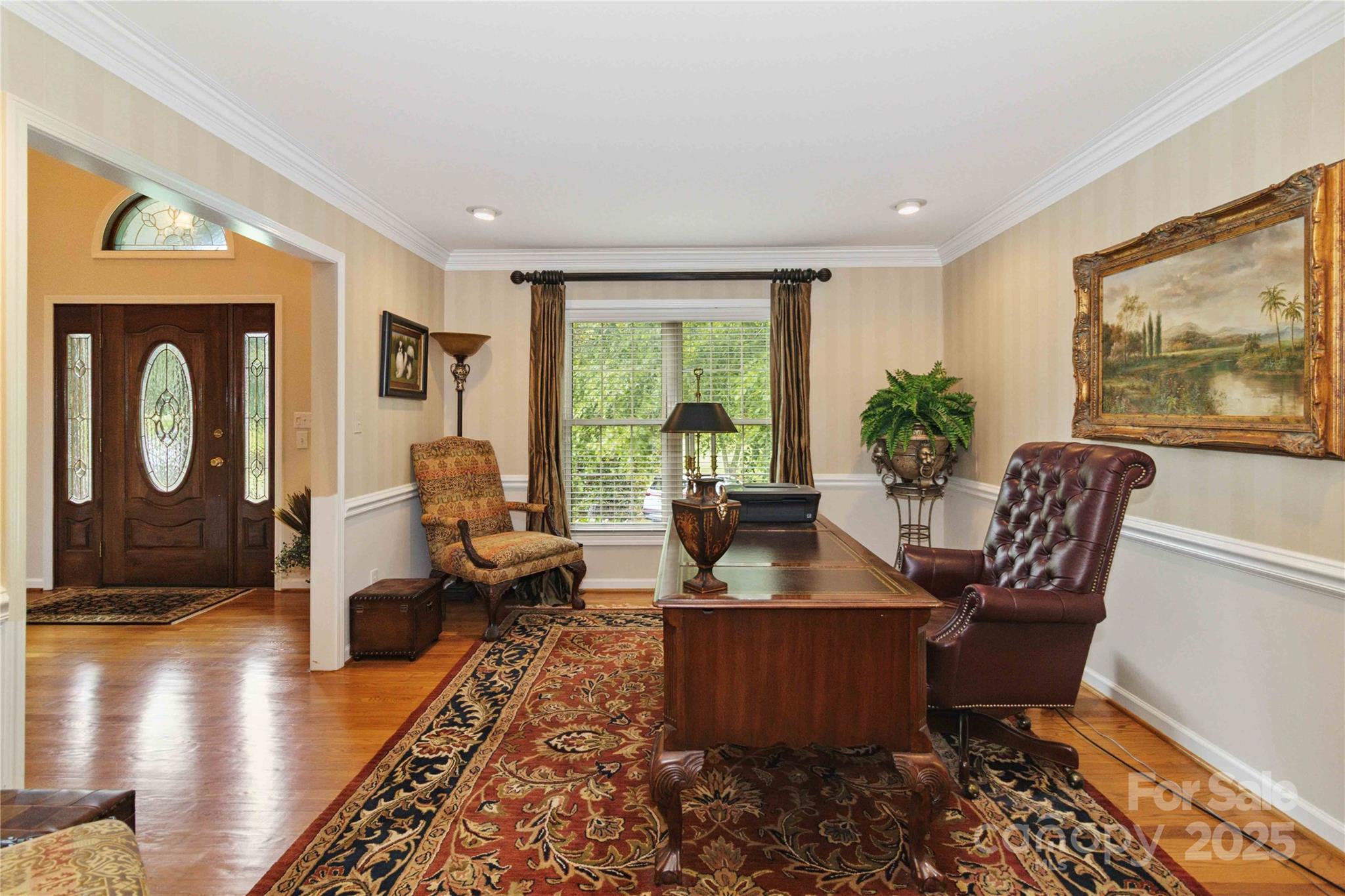 865 State Rd S-46-151 Clover, SC 29710 - Photo 14 of 48 a living room with furniture a large window and wooden floor