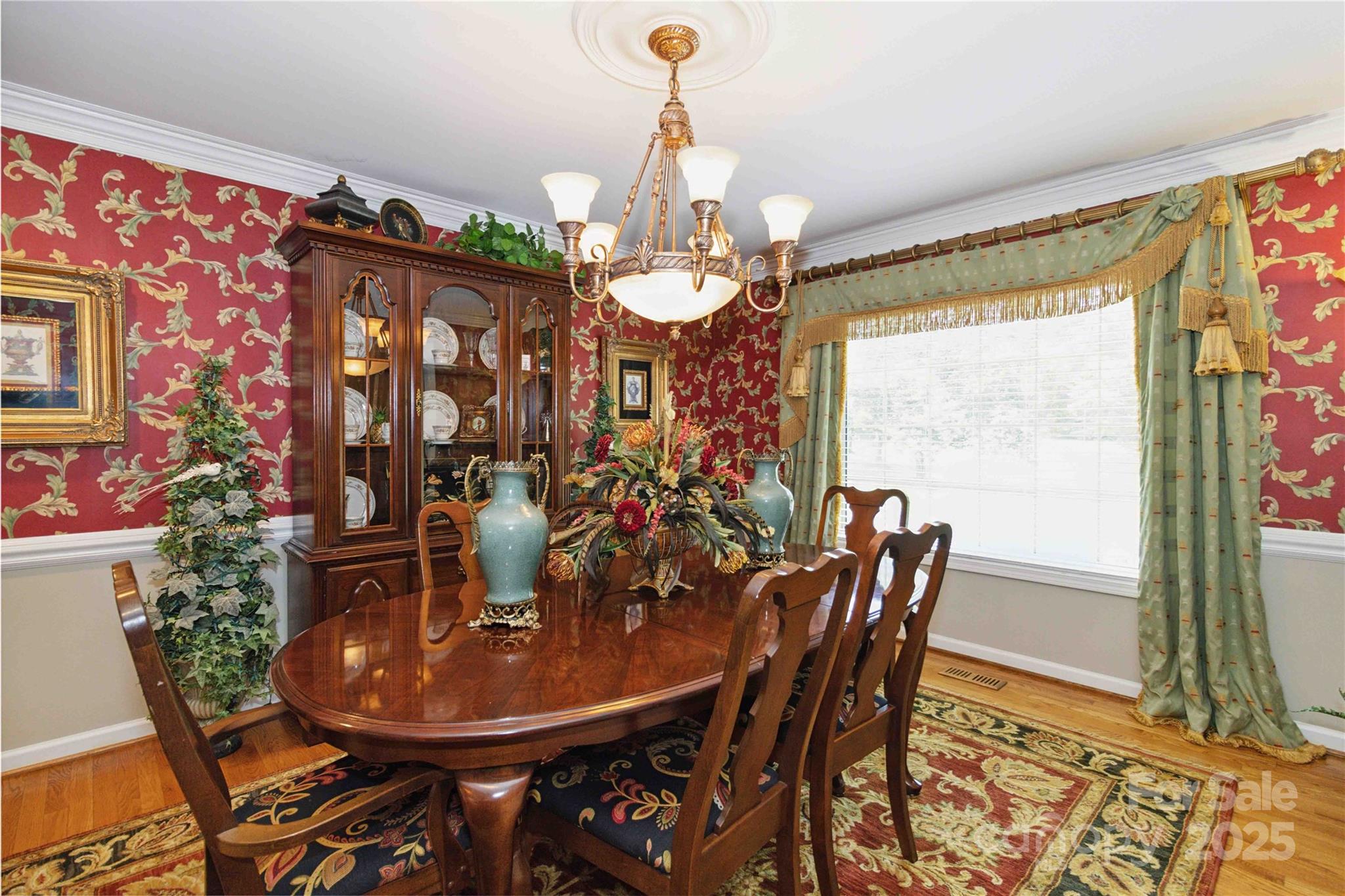 865 State Rd S-46-151 Clover, SC 29710 - Photo 17 of 48 a view of a dining room with furniture window and wooden floor