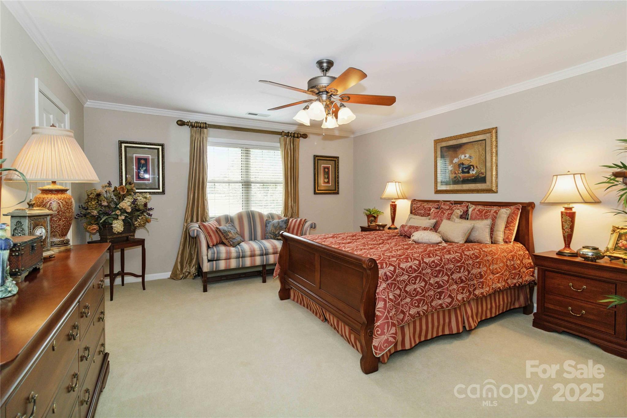 865 State Rd S-46-151 Clover, SC 29710 - Photo 24 of 48 a spacious bedroom with a bed couch and a window