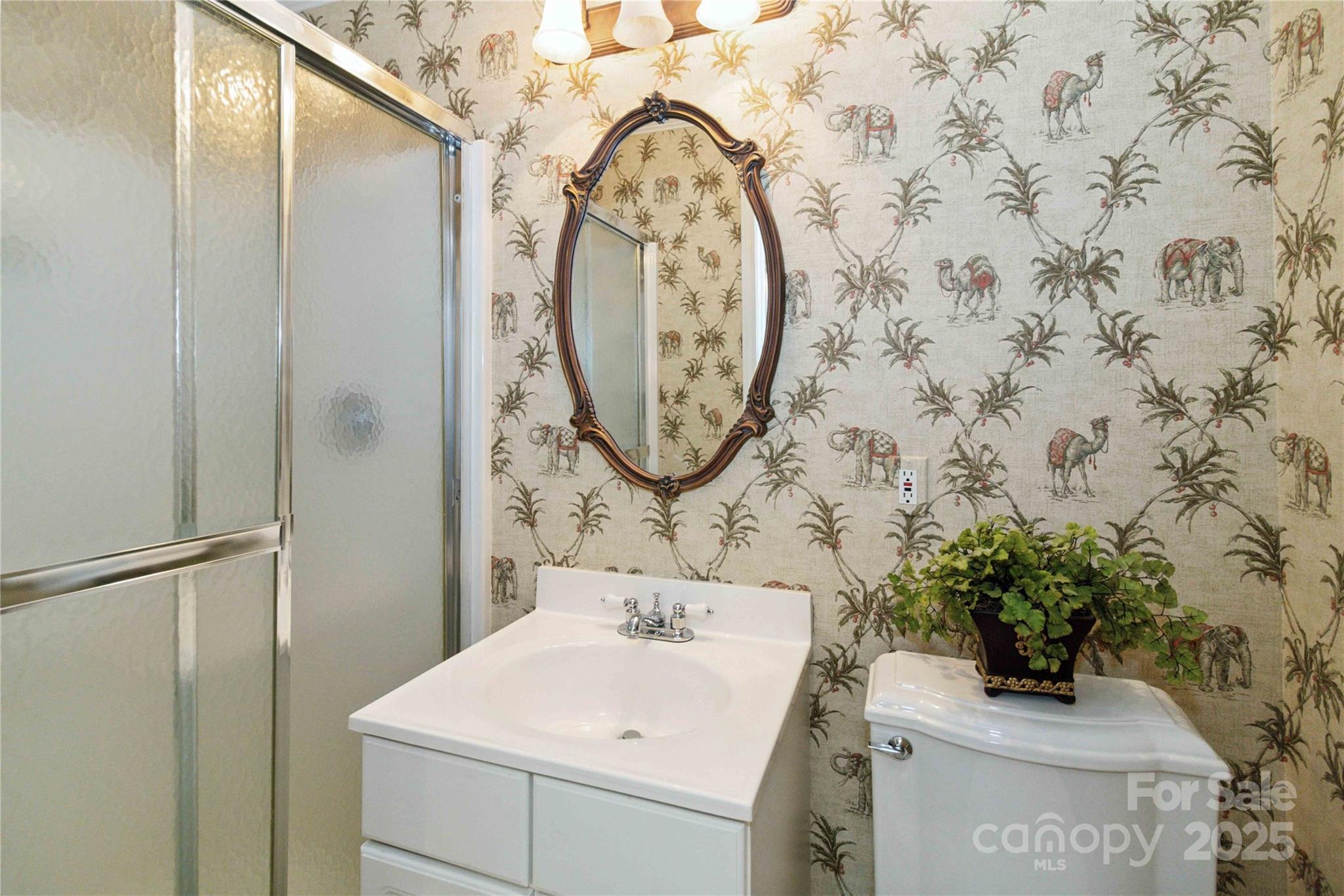 865 State Rd S-46-151 Clover, SC 29710 - Photo 26 of 48 a bathroom with a sink and a mirror