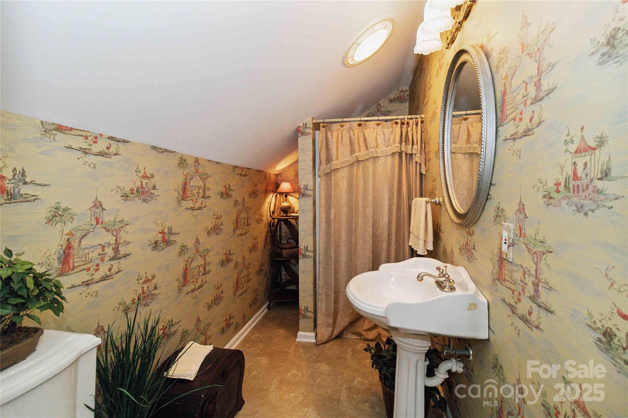 865 State Rd S-46-151 Clover, SC 29710 - Photo 28 of 48 a bathroom with a sink toilet and shower