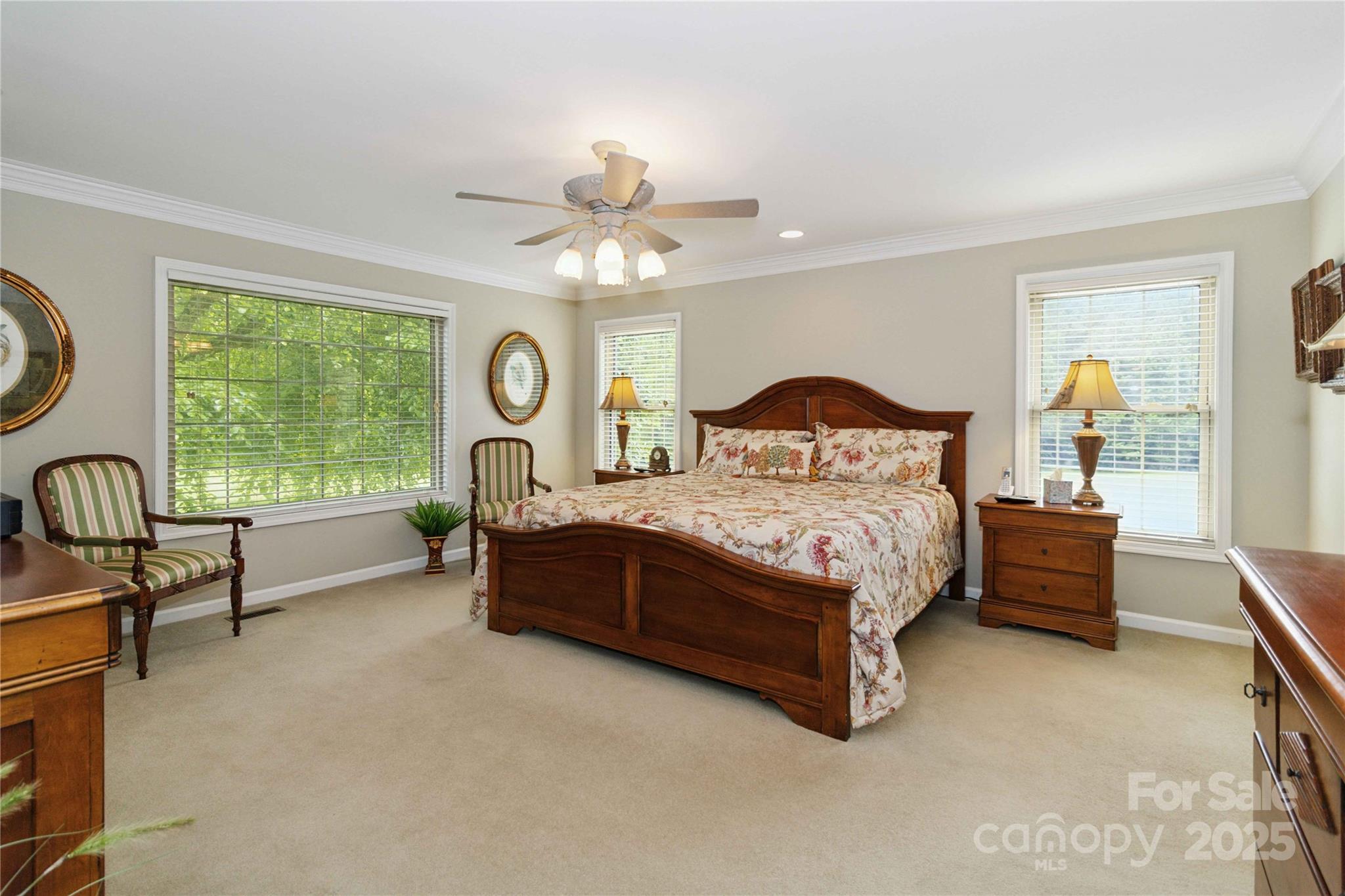 865 State Rd S-46-151 Clover, SC 29710 - Photo 30 of 48 a bed room with a bed and a chandelier