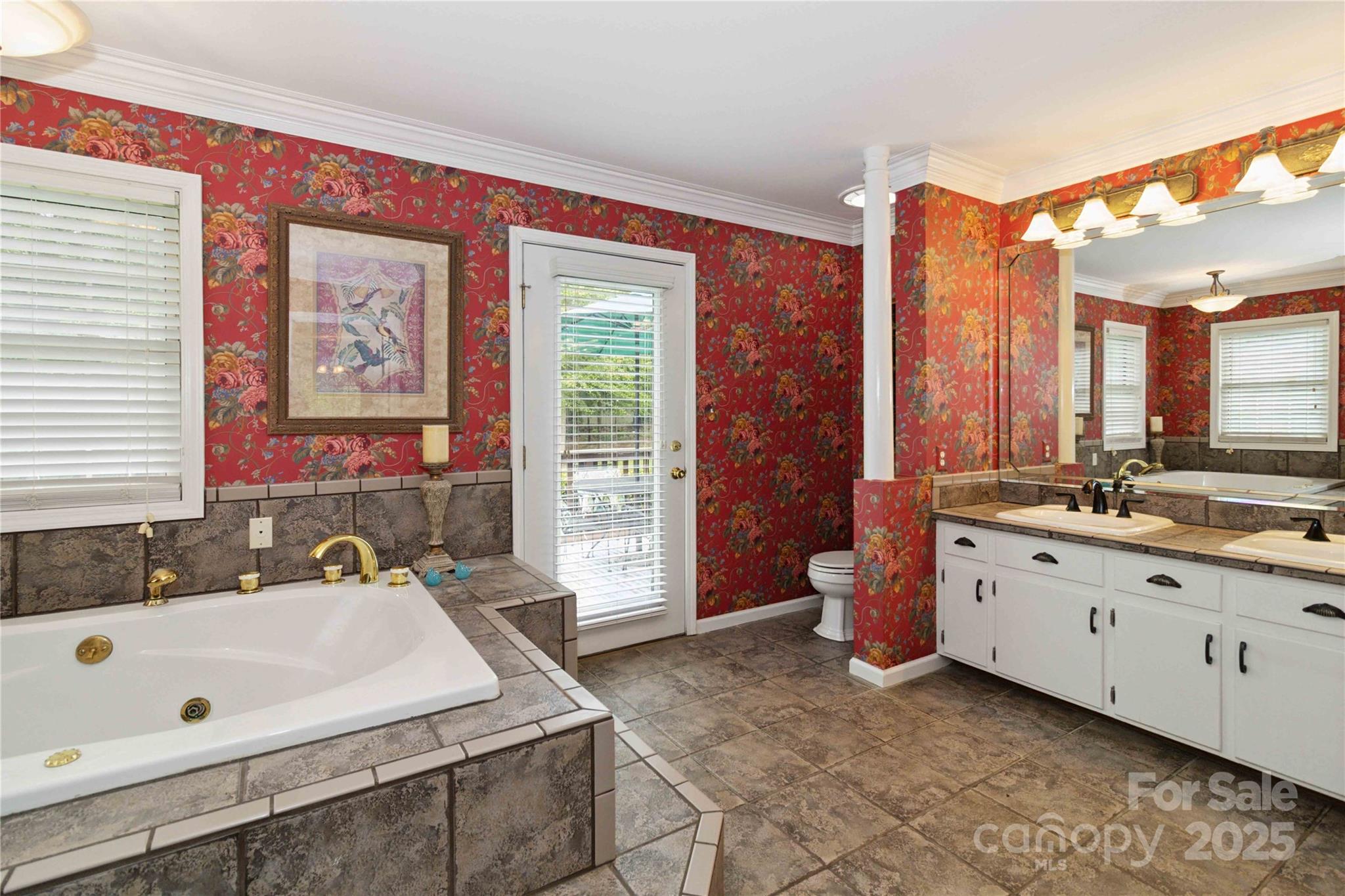 865 State Rd S-46-151 Clover, SC 29710 - Photo 32 of 48 a spacious bathroom with a tub sink and mirror