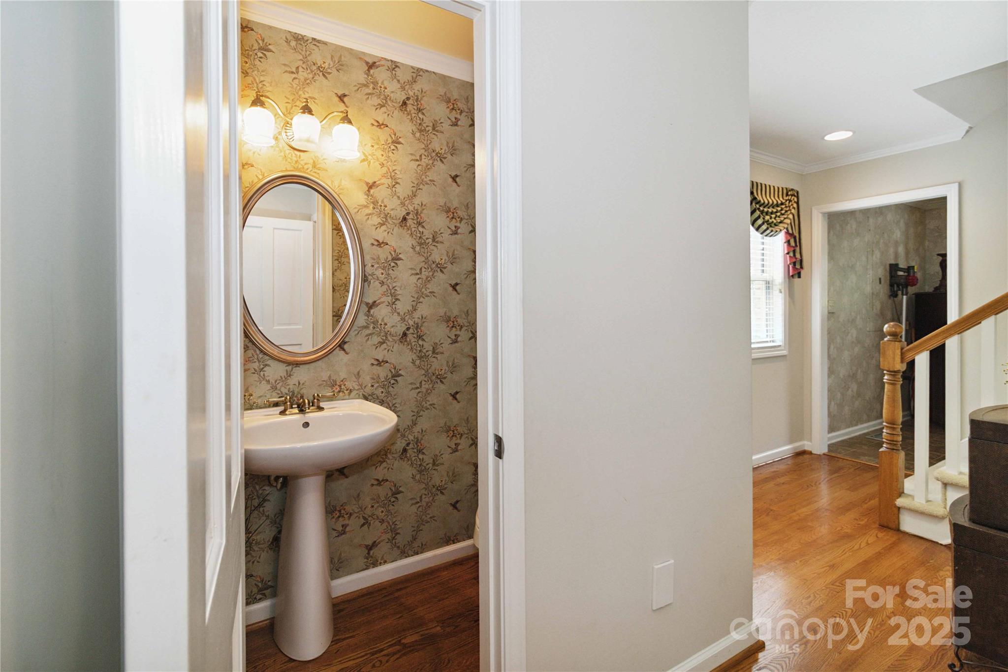 865 State Rd S-46-151 Clover, SC 29710 - Photo 35 of 48 a bathroom with a sink a mirror and a shower