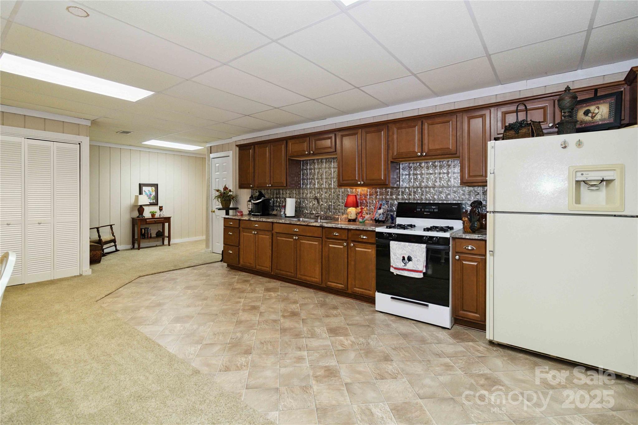 865 State Rd S-46-151 Clover, SC 29710 - Photo 38 of 48 a kitchen with stainless steel appliances a stove a sink and a refrigerator