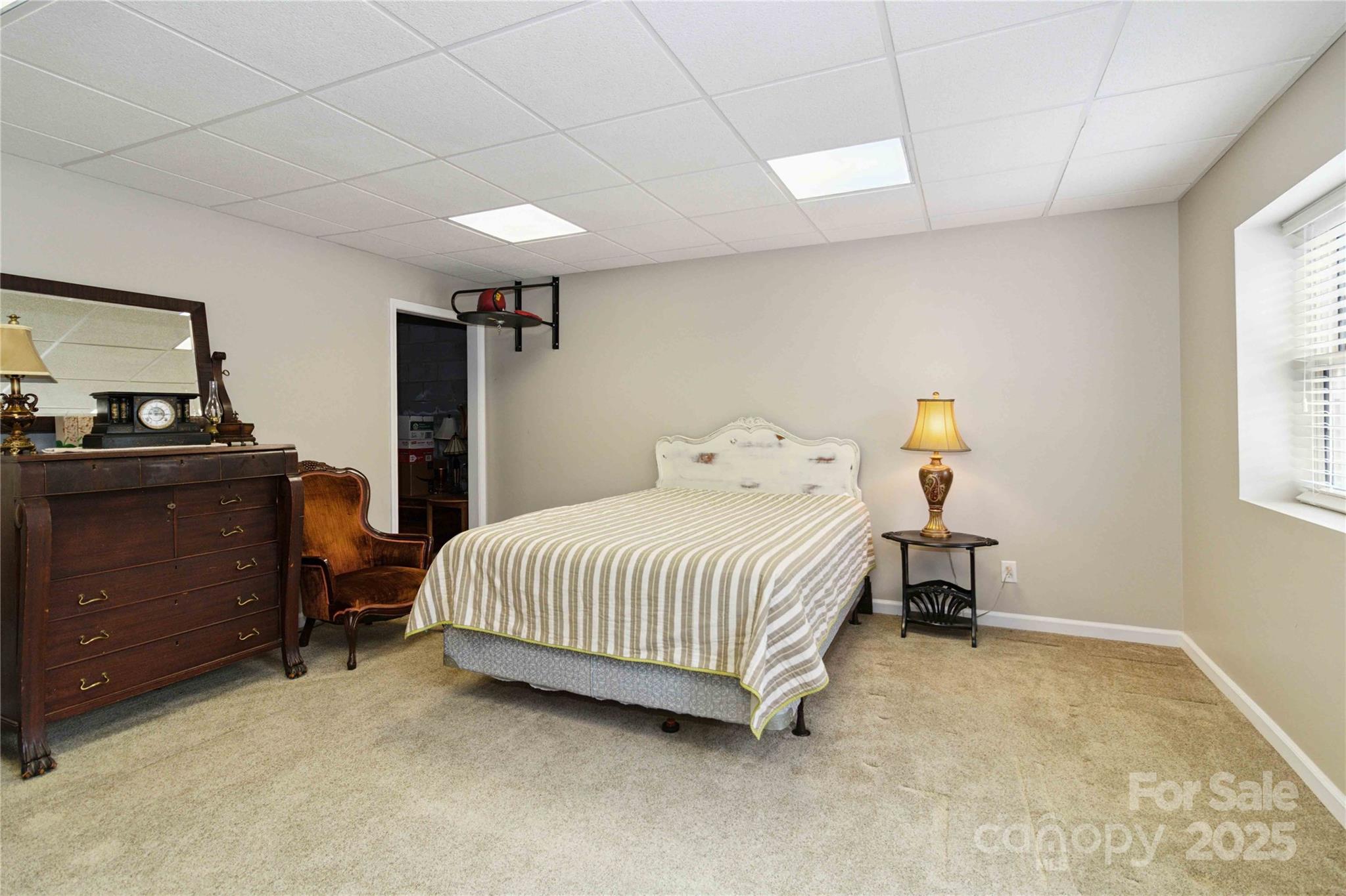 865 State Rd S-46-151 Clover, SC 29710 - Photo 40 of 48 a bedroom with a bed and a window