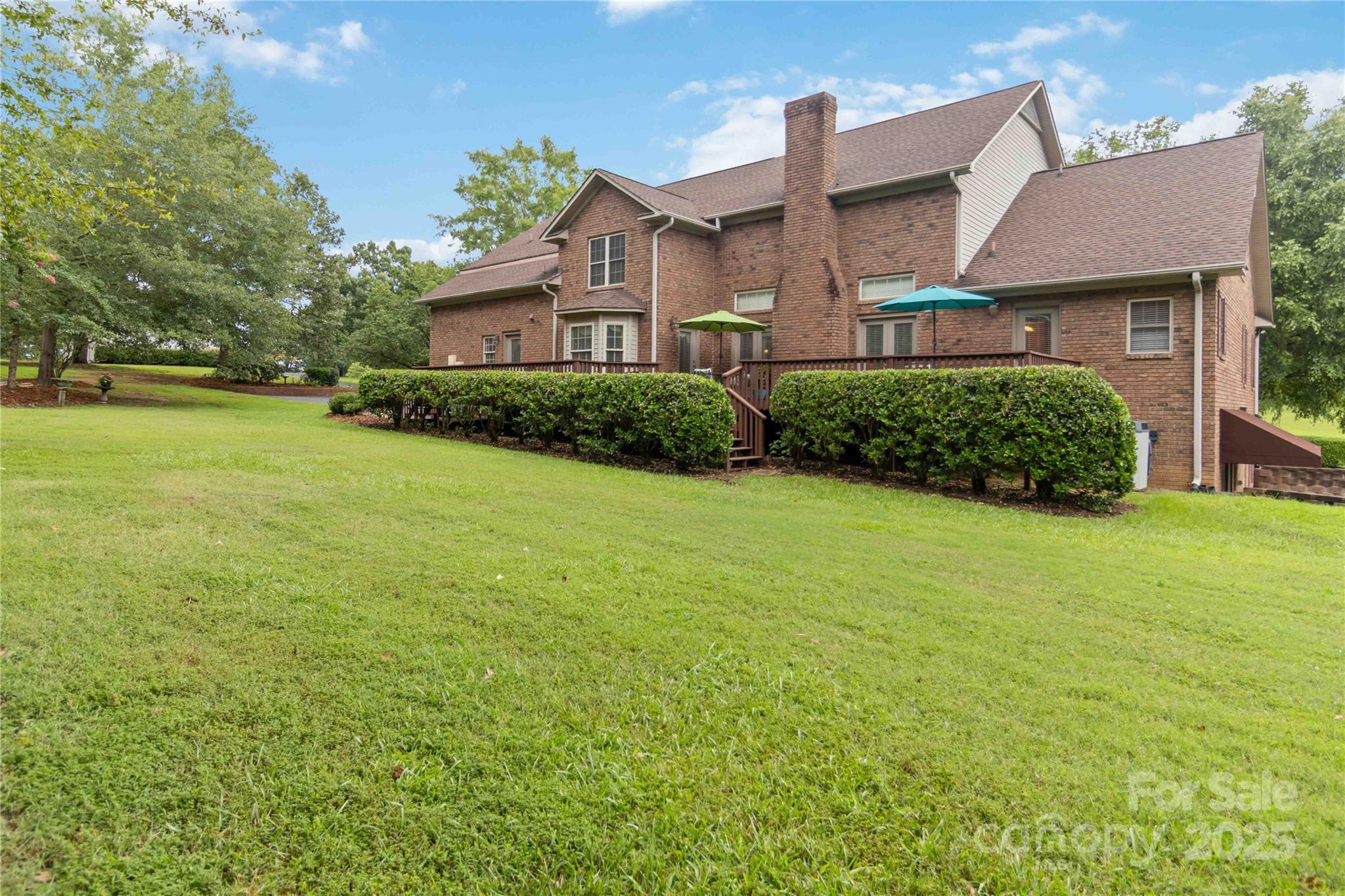 865 State Rd S-46-151 Clover, SC 29710 - Photo 44 of 48 a front view of a house with garden