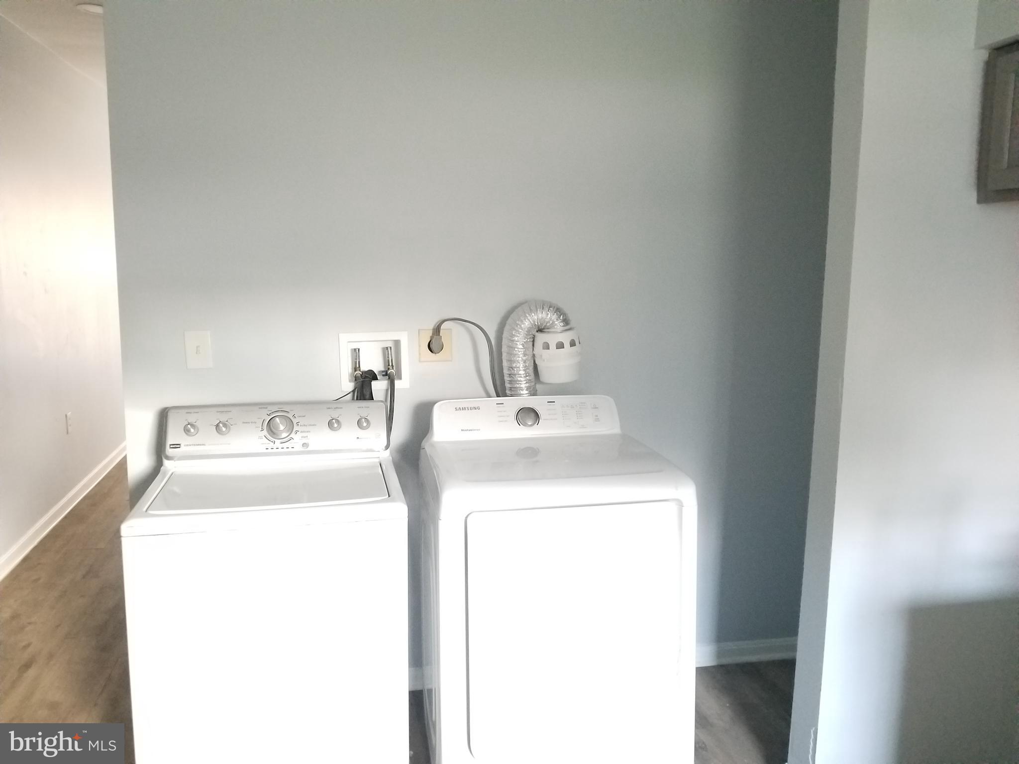 1624 West Lexington Street Baltimore, MD 21223 - Photo 11 of 63 a utility room with dryer and washer