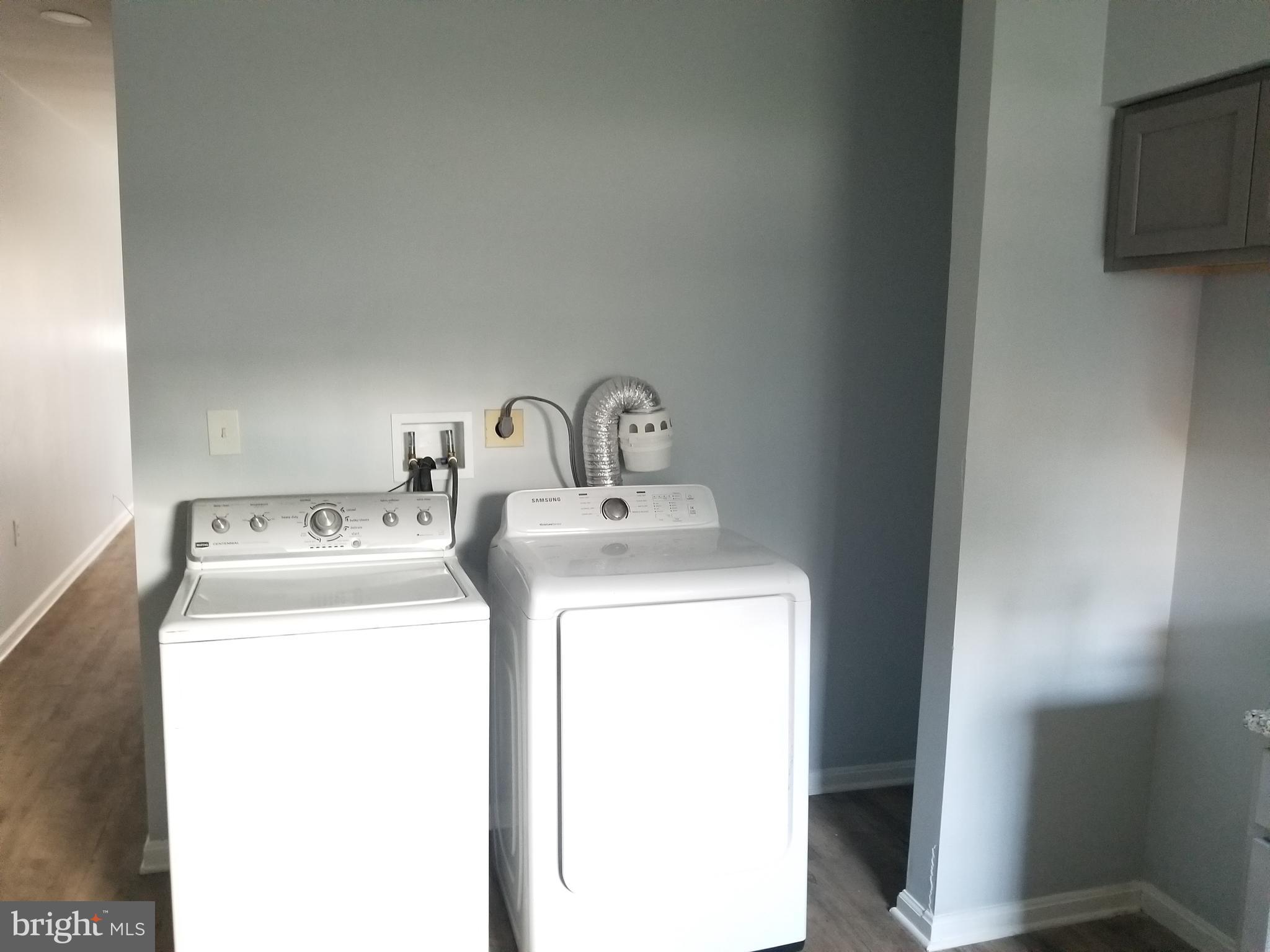 1624 West Lexington Street Baltimore, MD 21223 - Photo 12 of 63 a utility room with dryer and washer