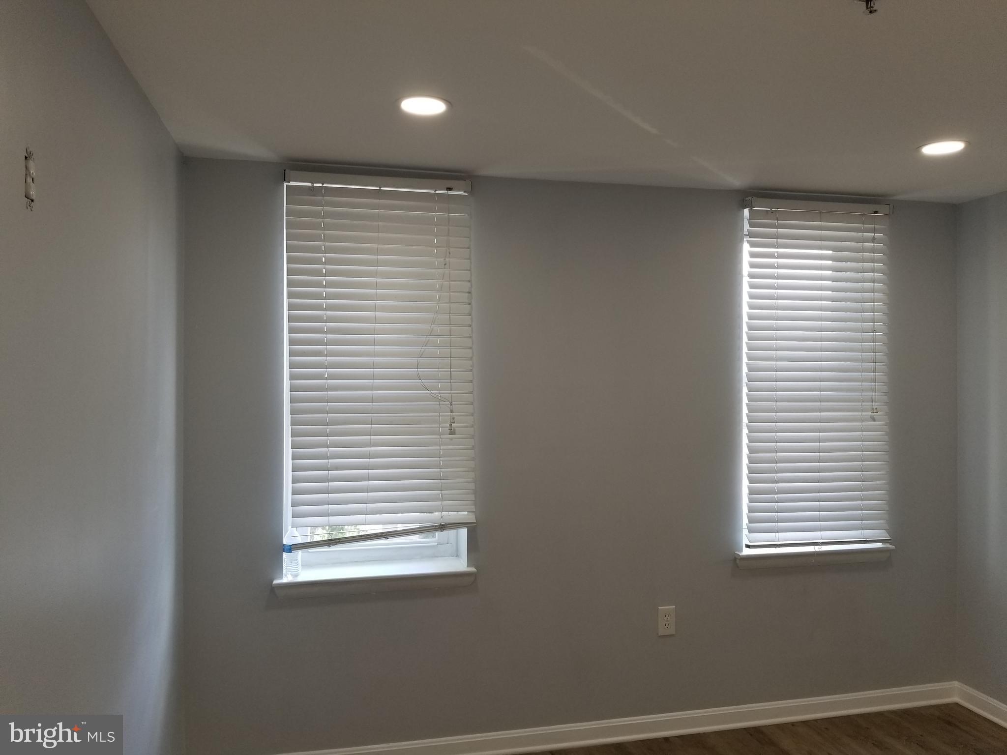 1624 West Lexington Street Baltimore, MD 21223 - Photo 39 of 63 a view of an empty room with a window