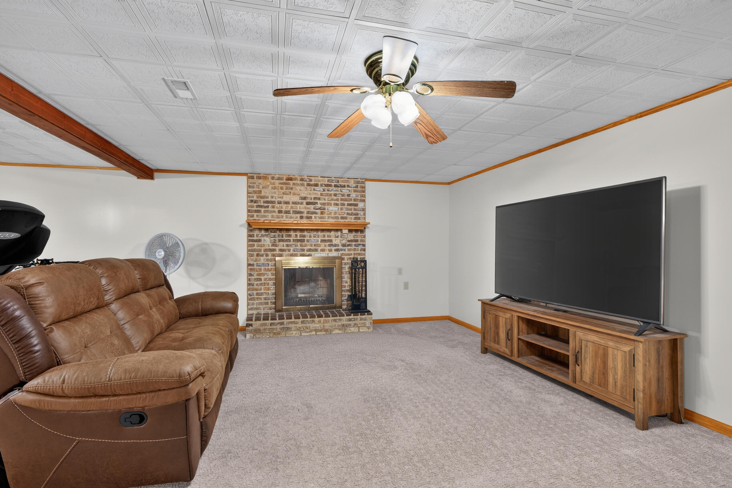 107 Squires Pointe Road Paris, KY 40361 - Photo 37 of 55 Wood burning fireplace in basement recreational room/family room.