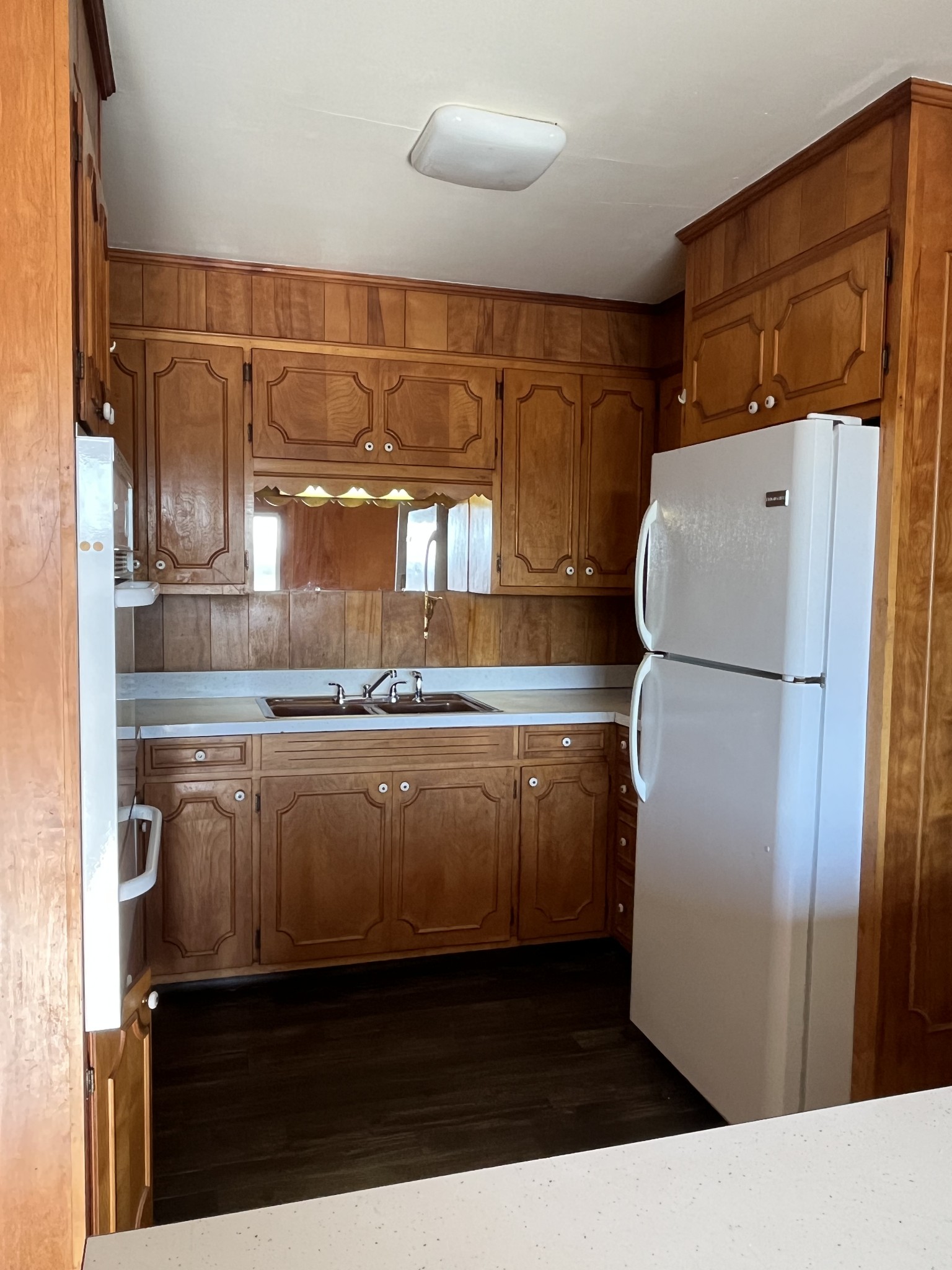 14403 Newstead Road Herndon, KY 42236 - Photo 12 of 25 a kitchen with a refrigerator and a stove